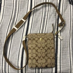 Brown coach cross body purse